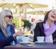 Two female friends having goot time together